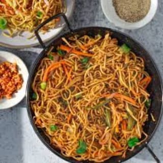 Veggie Hakka Noodles In Schezwan Sauce